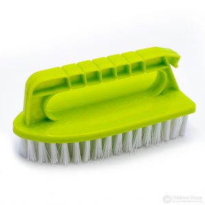 Scrub the table with this plastic scrubbing brush after sweeping the table with the mini dustpan and brush set