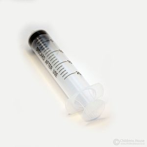 This image of the 20ml syringe, shows the plunger depressed. It helps to strengthen the Child's fine motor muscles. This action encourages the development of the correct finger grip to hold a pencil.