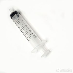 This image of the 10ml syringe, shows the plunger depressed. It helps to strengthen the Child's fine motor muscles. This action encourages the development of the correct finger grip to hold a pencil.