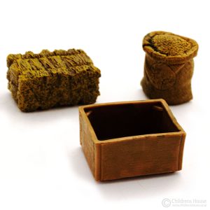 The featured image displays feed for farm animals, 3 miniature objects. A bale of hay, a bag of feed, and an empty box. These items are some of the language objects for The Farm, which is sold by Childrens House