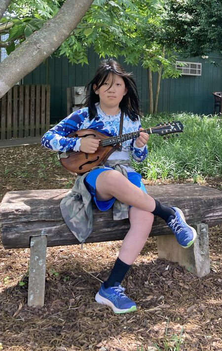 Mountaintop students have to opportunity to follow their dreams in the Arts as well, student playing a Mandolin